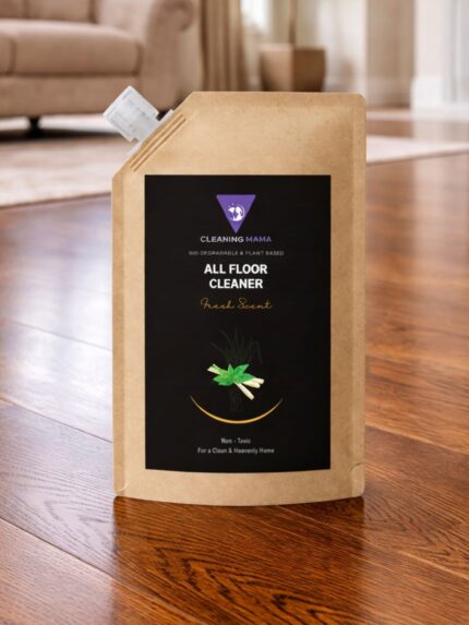 Cleaning Mama plant-based Fresh Scent All Floor Cleaner refill pouch displayed on a hardwood floor.