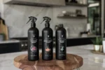Cleaning Mama plant-based cleaning trio featuring All Purpose, Marble & Granite and All Floor Cleaner displayed in a modern kitchen